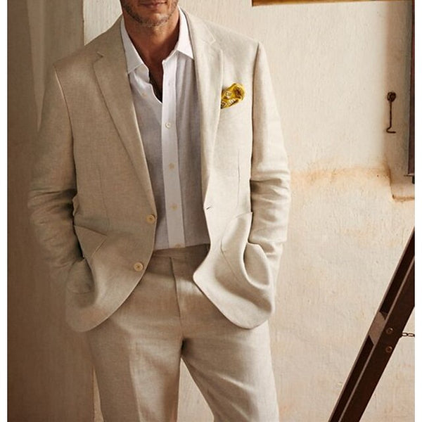 Cream linen single breasted formal suit with white dress shirt and gold pocket square
