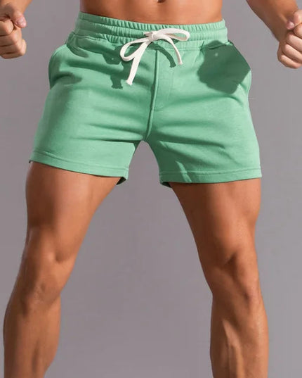 Mint green pull-on athletic shorts with white drawstring