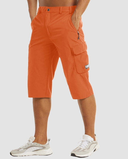 Orange cargo pocket knee length shorts with side utility pockets