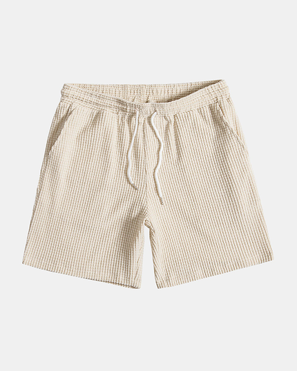 Beige ribbed shorts with drawstring and side pockets