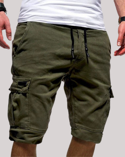 Olive green cargo shorts with drawstring, side pockets, and cuffed legs