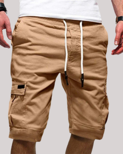 Khaki cargo shorts with white drawstring and utility side cargo pockets