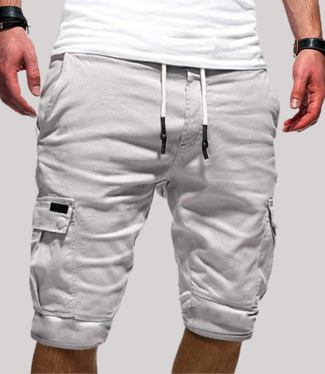 Light gray cargo shorts with drawstring, side cargo pockets, and rolled cuffs