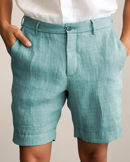 Teal linen summer shorts with straight leg silhouette and front pockets