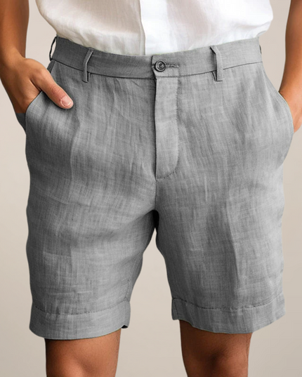 Gray linen shorts with straight leg design and rolled hem detail