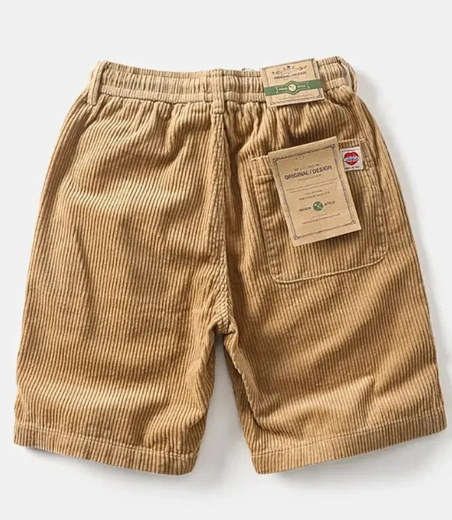 Back view of tan corduroy shorts showing rear pockets and label