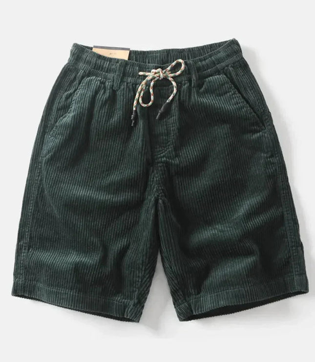 Dark green corduroy shorts with cream drawstring and side pockets