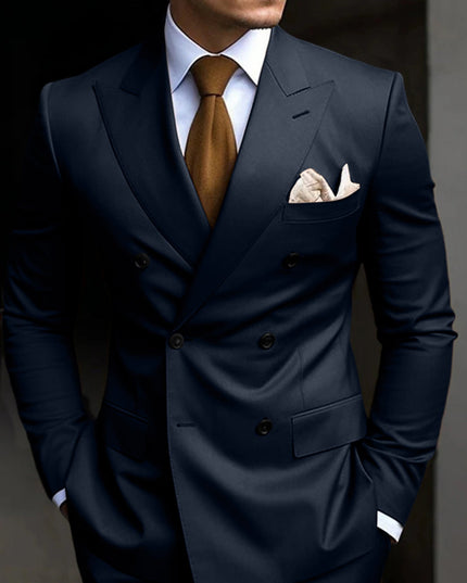 Navy blue double-breasted formal suit with peaked lapels and pocket square