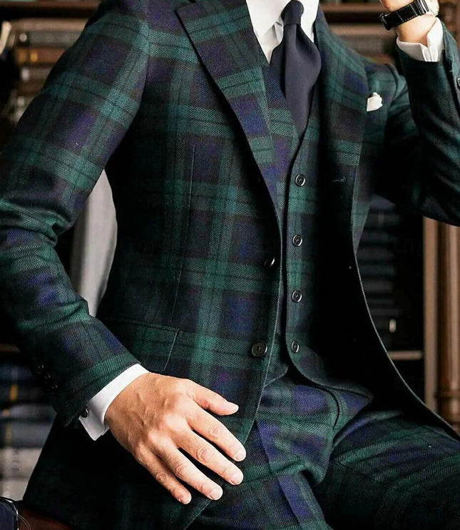 Close-up of tartan plaid formal suit jacket with button detail and white shirt cuff