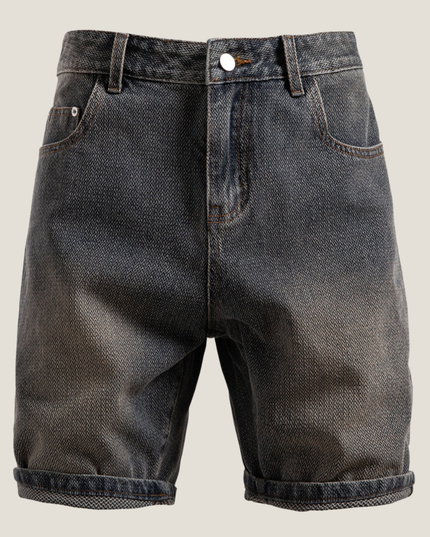 Front view of textured denim shorts with white button and rolled cuffs