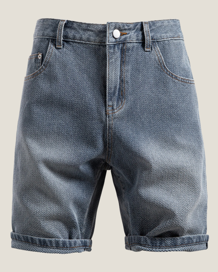Back flat lay of blue denim shorts showing rolled hem construction