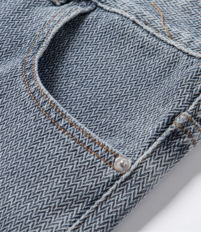 Detail shot of back pocket with contrast thread on denim shorts