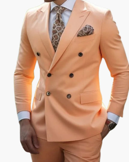 Peach double-breasted peak lapel formal suit with patterned tie and pocket square
