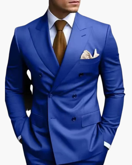 Royal blue double-breasted peak lapel formal suit with brown tie and white pocket square