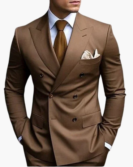 Tan double-breasted peak lapel formal suit with brown tie and white pocket square