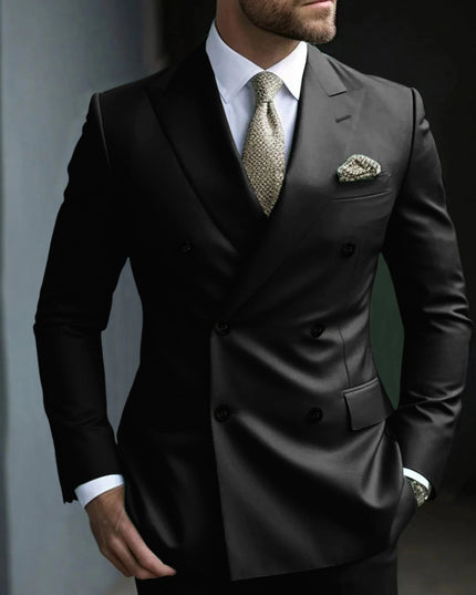 Black double breasted formal suit with notch lapels and matching tie