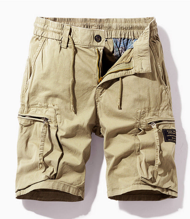 Beige cargo shorts flat lay showing drawstring, button closure, and cargo pocket details