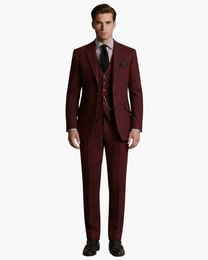Burgundy tweed three-piece suit with vest and chain detail