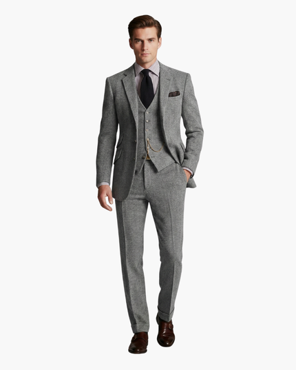 Medium gray tweed three-piece suit with chain detail