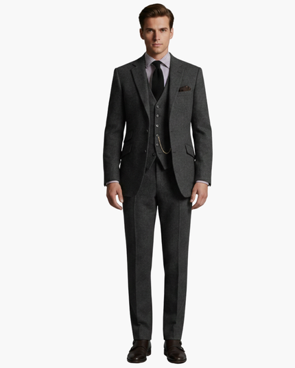 Dark gray tweed three-piece suit with vest and pocket chain