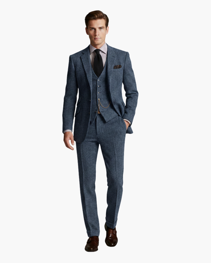 Blue-gray tweed three-piece suit with chain and vest detail