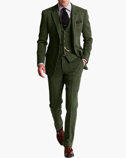 Green tweed three-piece suit with matching vest and chain