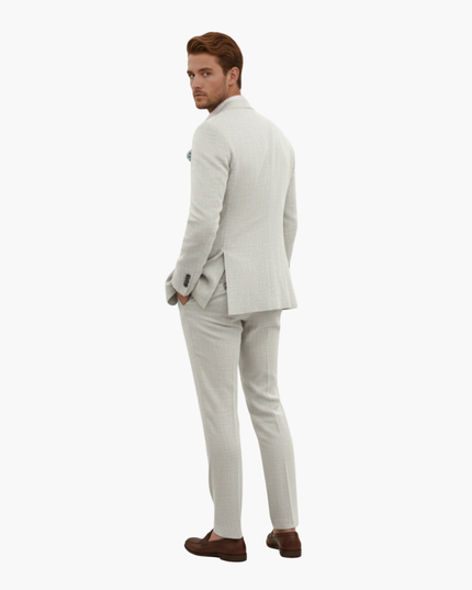 Light gray linen suit back view showing jacket construction and trousers