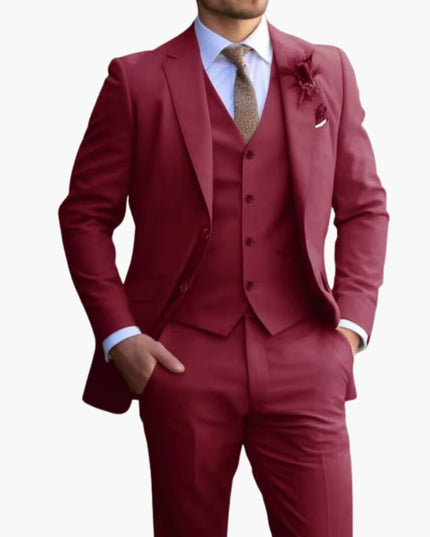 Burgundy formal three piece suit with notched lapel jacket and matching vest on model