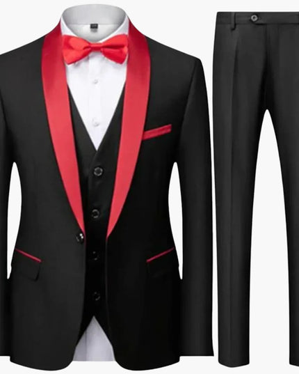 Black formal three-piece suit with red shawl collar and matching bow tie