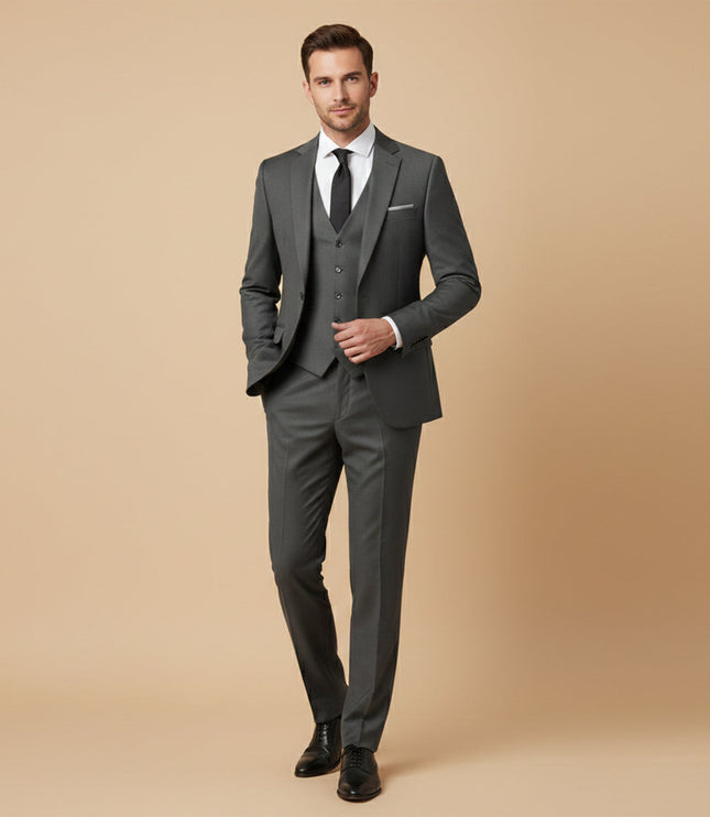 Charcoal gray formal suit styled with white shirt and black tie