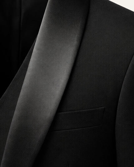 Close-up of black satin lapel on formal tuxedo jacket
