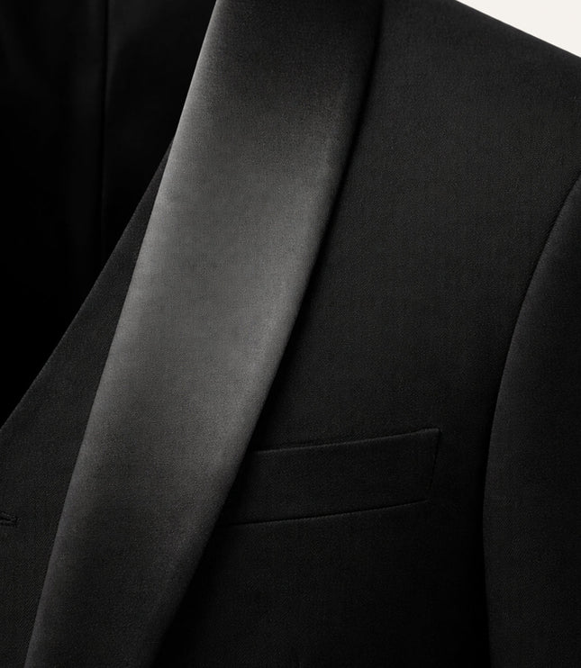 Close-up of black satin lapel on formal tuxedo jacket