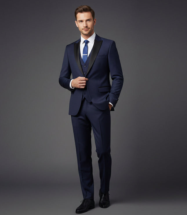 Navy tuxedo suit styled with white shirt and blue tie