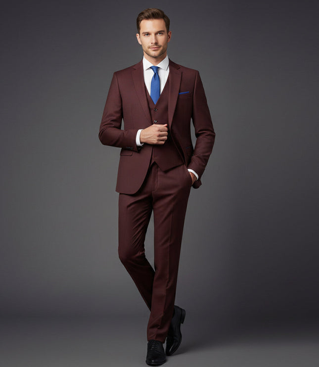 Burgundy formal suit worn with white shirt and blue tie