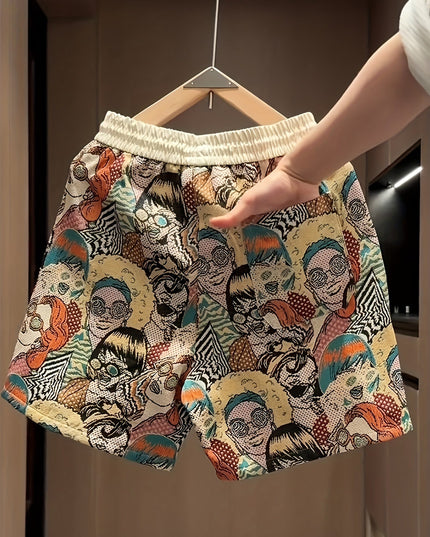 Wide leg shorts with cream waistband and all-over graphic print in orange, teal, and black