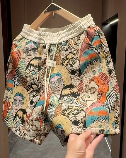 Relaxed fit shorts displaying detailed graphic artwork with illustrated character faces throughout