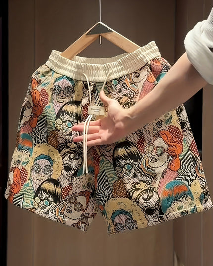 Men's graphic shorts with drawstring waist and loose wide leg silhouette in mixed color print