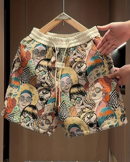 Wide leg relaxed shorts with cream elastic waistband and bold multi-color graphic design