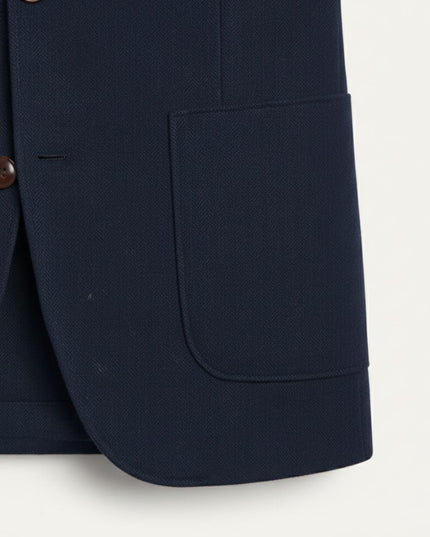 Navy herringbone tweed single-breasted blazer with brown buttons and patch pocket