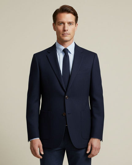 Navy tailored blazer front view with notch lapels and two-button closure
