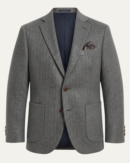 Gray herringbone tweed tailored blazer with brown buttons and patch pockets