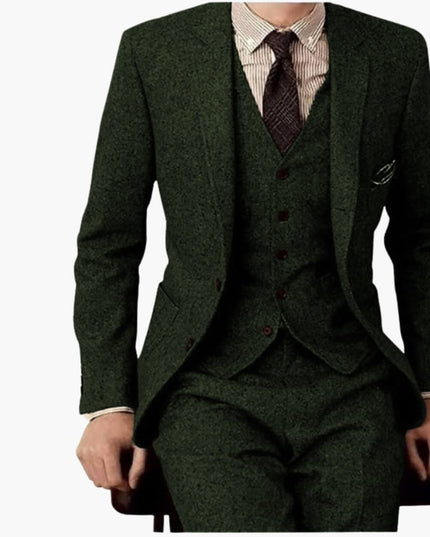 Forest green wool blend three-piece formal suit with fitted blazer and matching vest for men