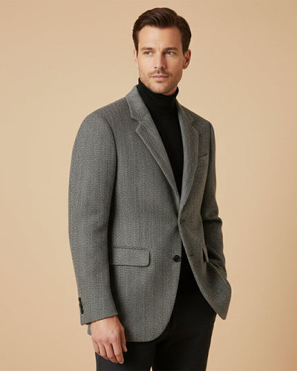 Gray herringbone wool blazer styled with black turtleneck