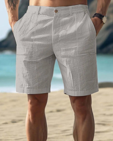 Light gray men's linen flat front shorts with knee length fit and side pockets