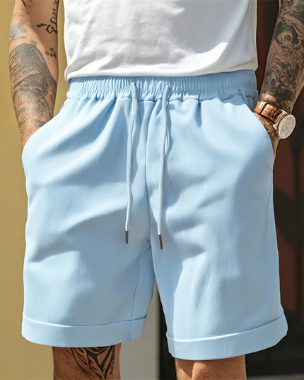 Light blue relaxed pull-on shorts with elastic waistband and turnup cuff