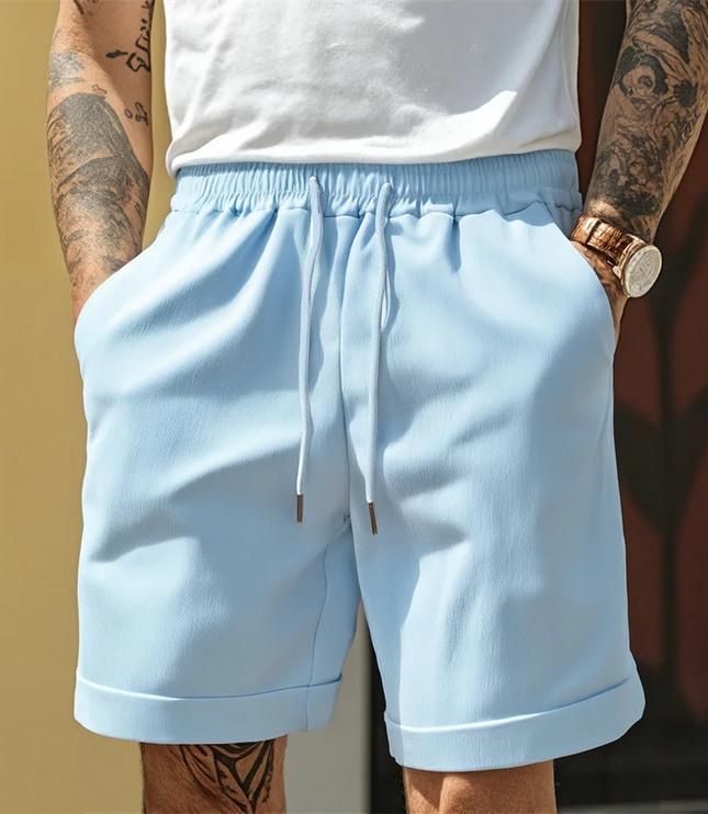 Light blue relaxed pull-on shorts with elastic waistband and turnup cuff