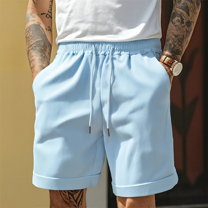 Light blue relaxed pull-on shorts with elastic waistband and turnup cuff
