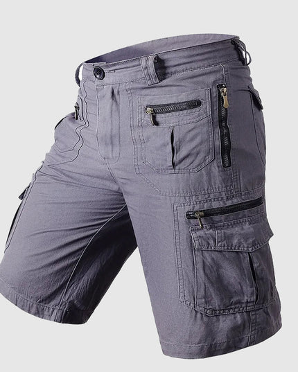Gray cargo shorts side view with zipper pockets and reinforced utility style