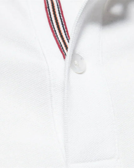 White polo shirt detail of striped collar and button placket