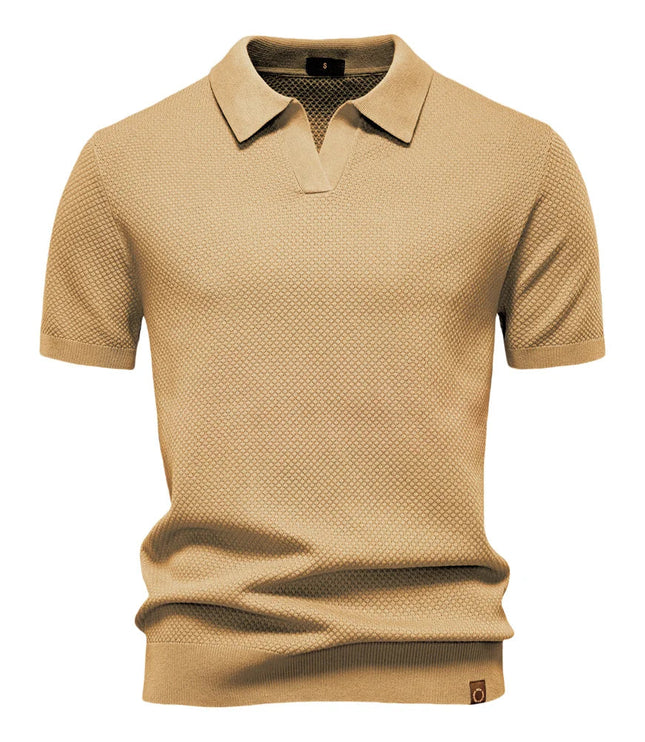 Tan textured short sleeve polo with ribbed collar and cuffs